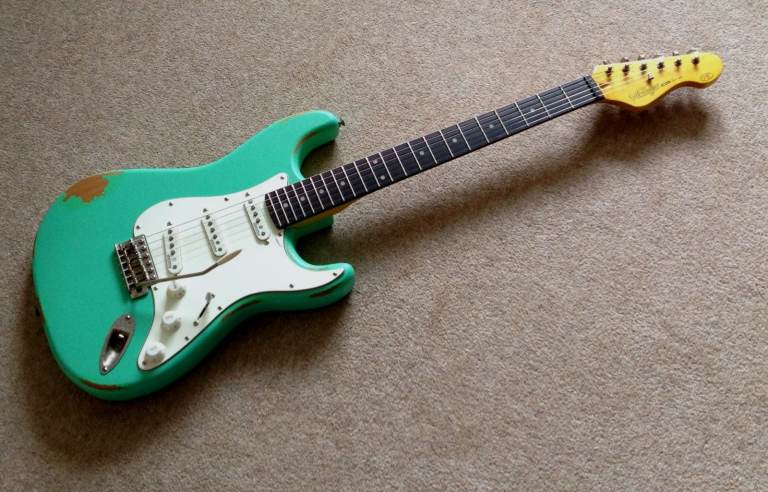 Vintage V6 Icon Series roadworn stratocaster type electric guitar