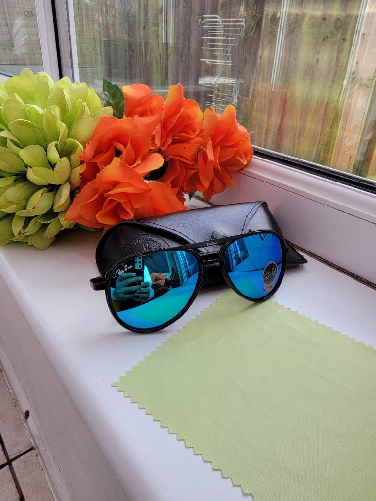 Rayban skyblue sunglasses with metal black frame 