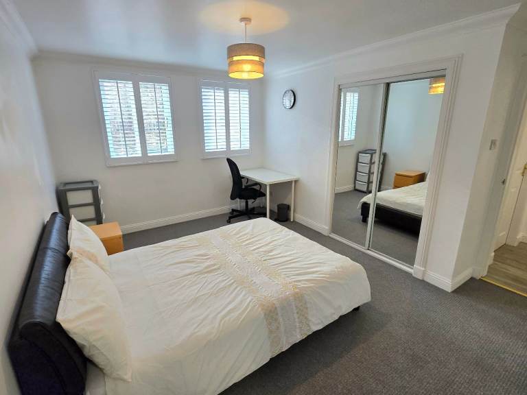 Modern furnished bedroom with private ensuite