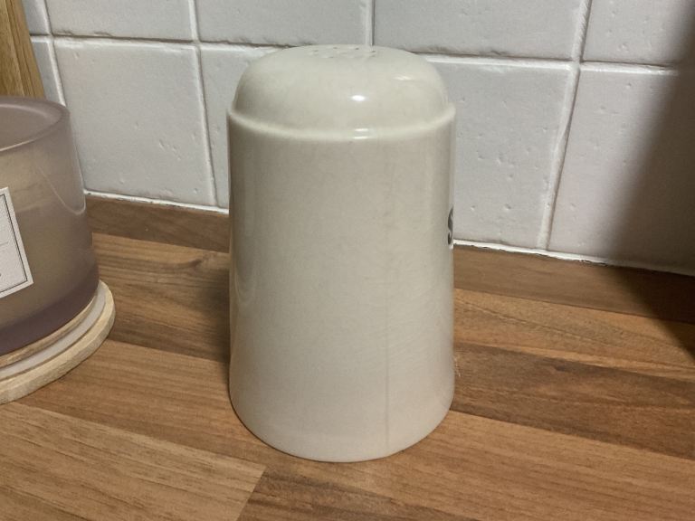 Vintage white sugar pourer