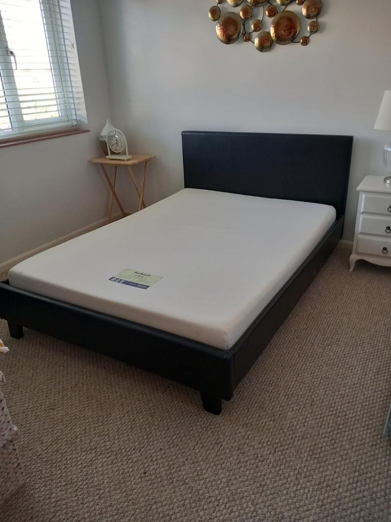 Queen size bed (large single) with memory foam mattress and headboard.