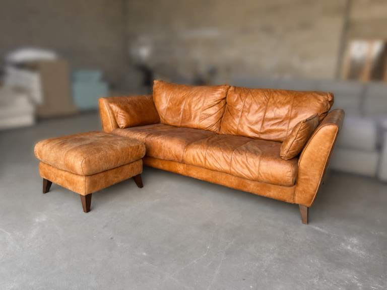 Leather Three Seater Sofa And Footstool (Delivery Available)