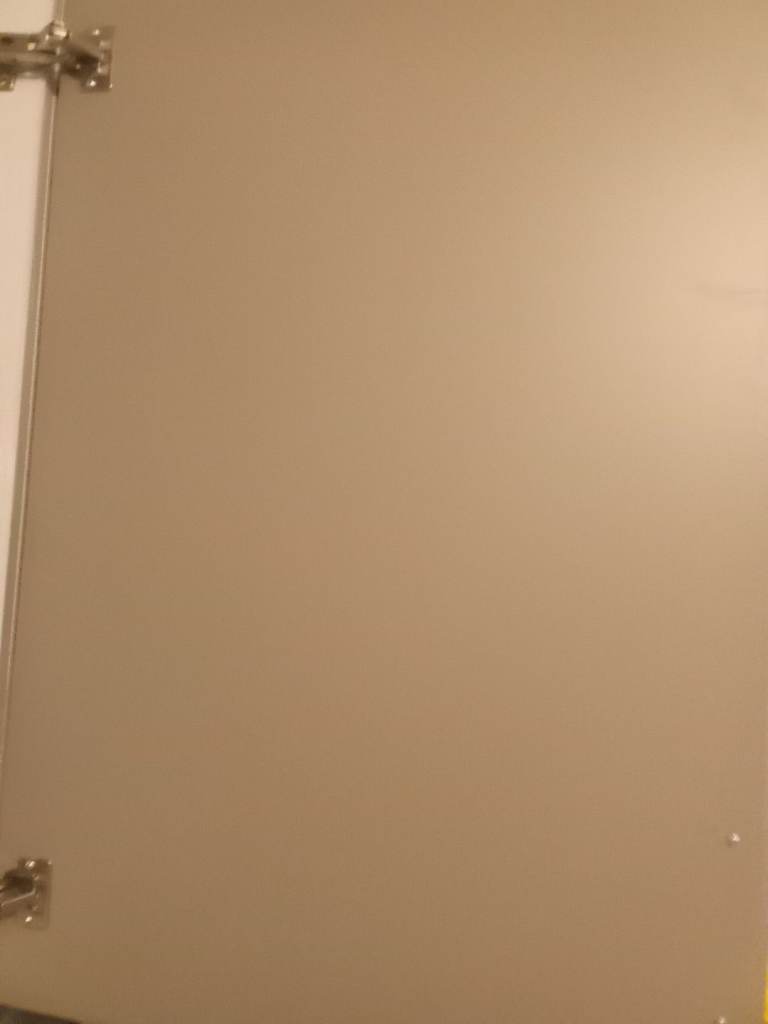 Inside of cupboard needs wallpapering 