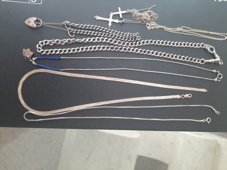 Bundle of Silver Chains and Necklaces with Pendants