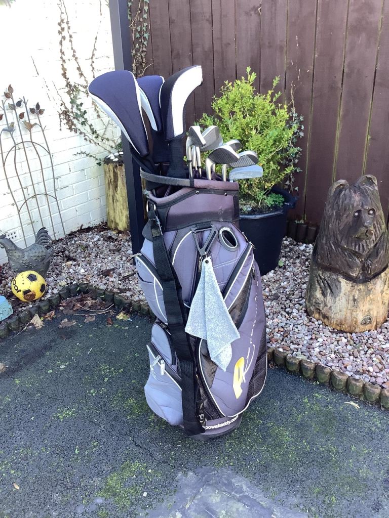 Set of MacGregor HTM golf clubs, in a lovely Powakaddy golf bag. 