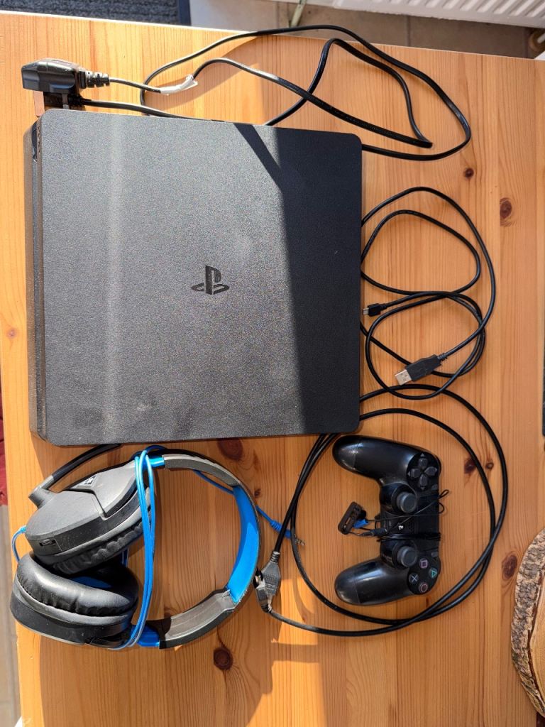 Sony PlayStation 4 Slim Console with Controller and Headset – Good Condition