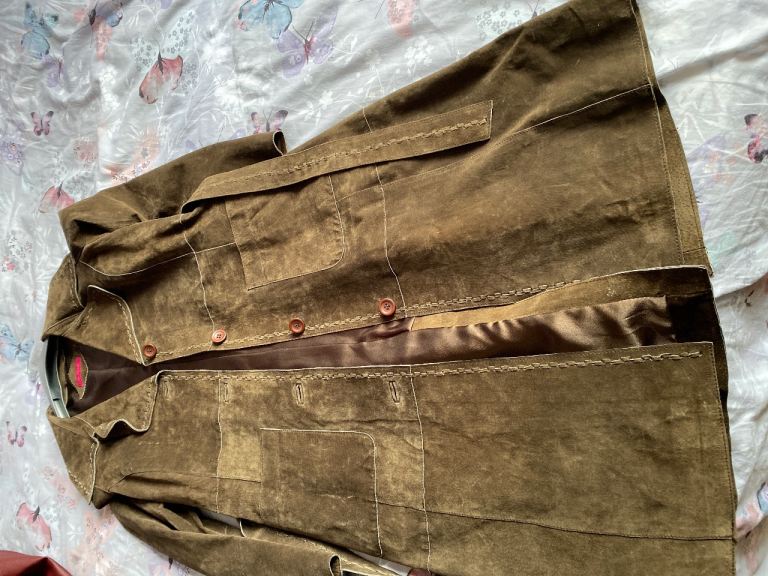 Unworn brown suede knee length coat