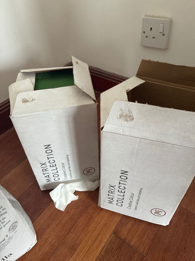 1.5 boxes of matrix green Topps tiles / free 