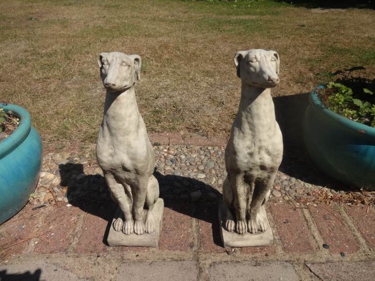 A PAIR OF STONE WHIPPETS ~ GARDEN ORNAMENT / GARDEN FEATURE 