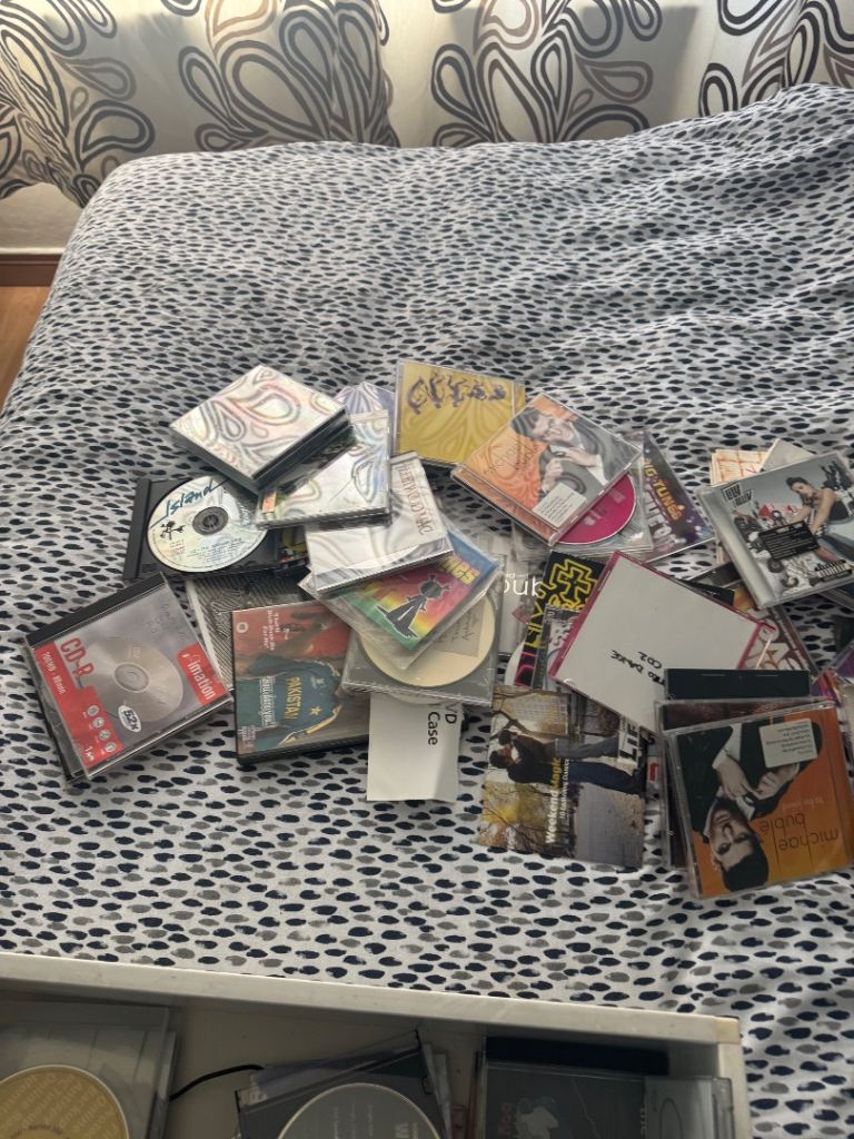 A box of different cds 