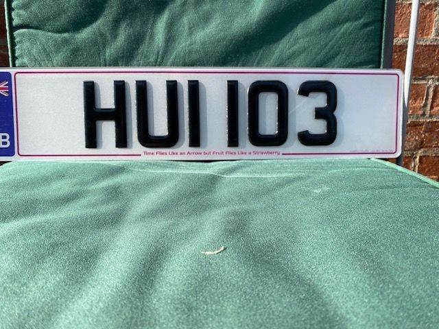 Cherished car number plate HUI 103 on a DVLA retention document.
