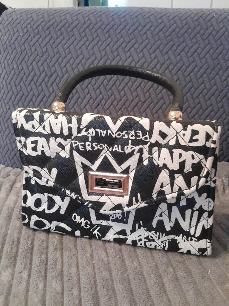 Stylish Quilted Handbag with Black and White Graffiti Print