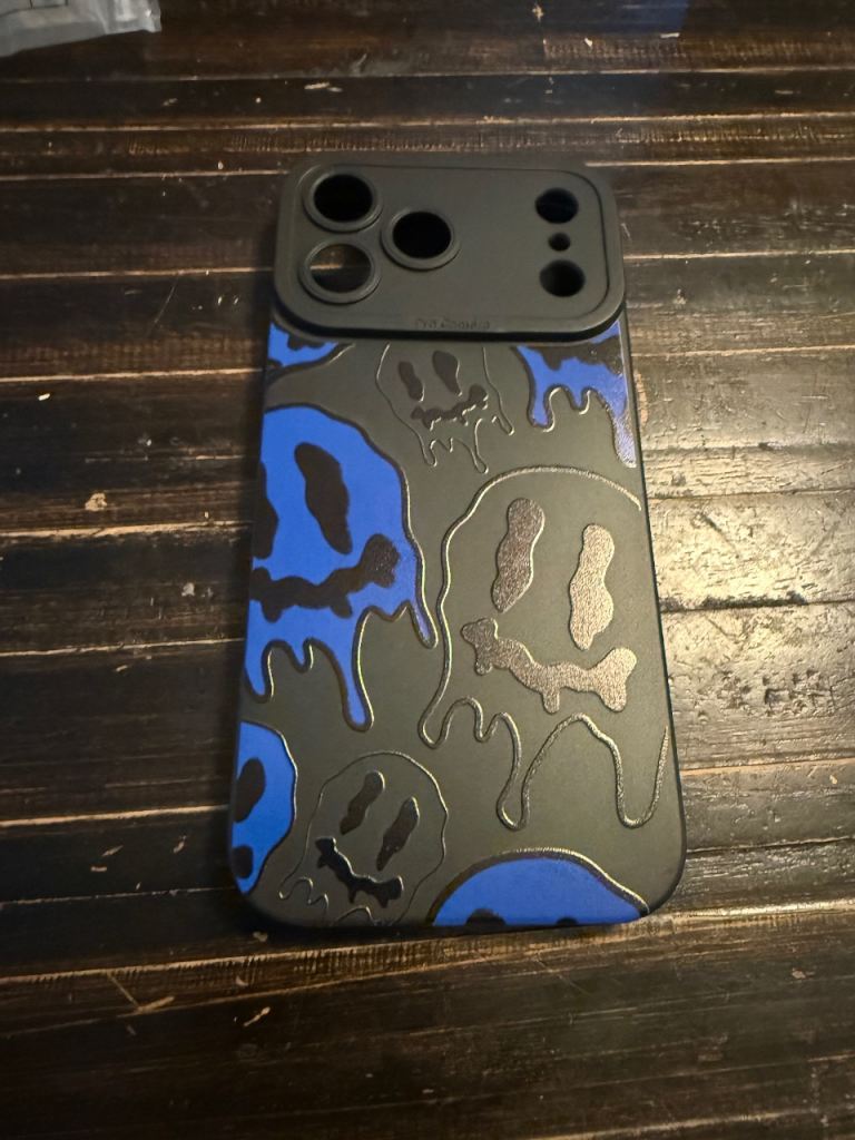 Funky iPhone Case with Blue Slime skulls  Design – Good Condition