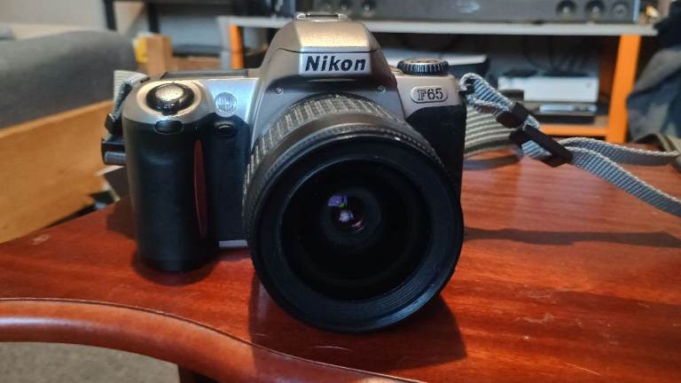 Nikon F65 SLR Camera with Lens and Strap – Good Condition