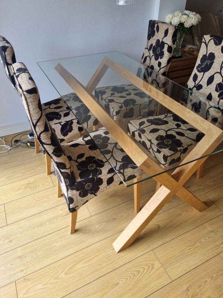 Glass Top Dining Table with 6 Patterned Chairs 