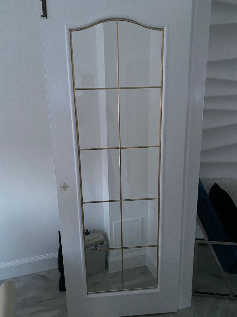 Glass doors with gold inserts 