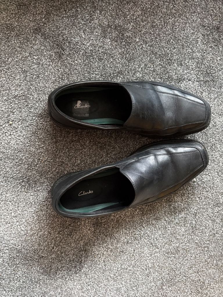 Old well worn size 12 Clarks men’s slip on shoes