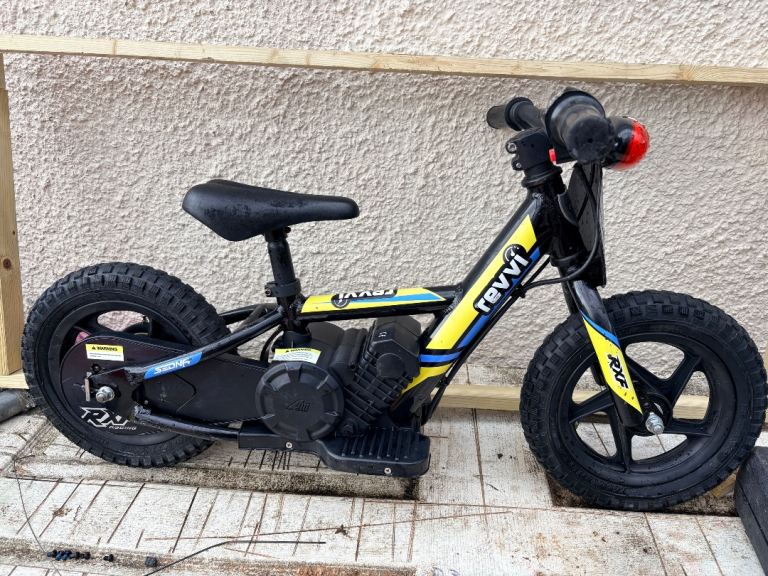Revvi 12” wheel electric kids bike 
