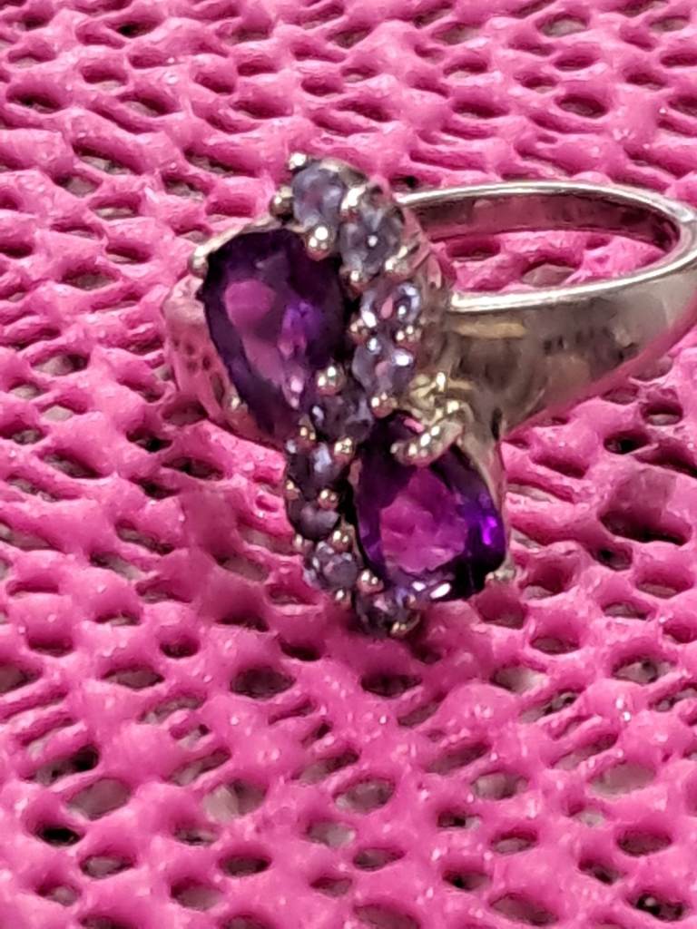 Sterling silver ring with two purple stones size N.5