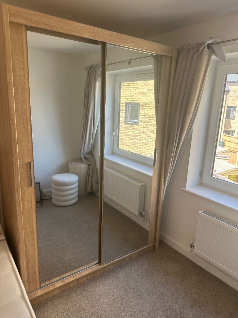FREE Sliding wardrobe with 2 large mirrors 