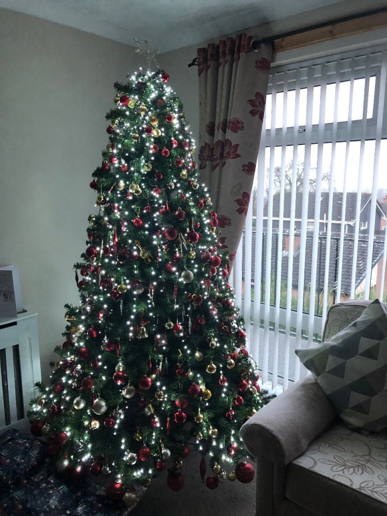 A 7 foot tall Christmas tree( from Hillmount) in 3 sections with stand would suit a school/church