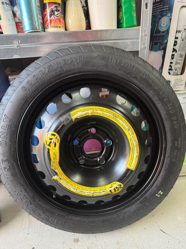 Space saver wheel and new scissor jack