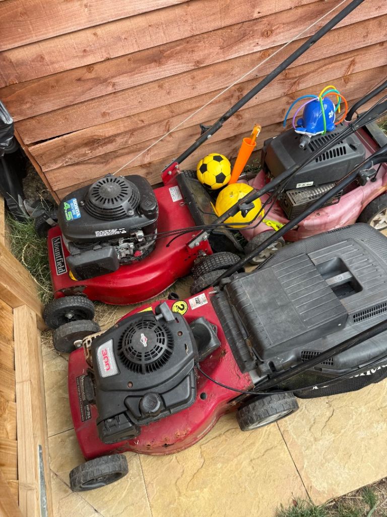 3 lawn mowers and pressure washer engine 