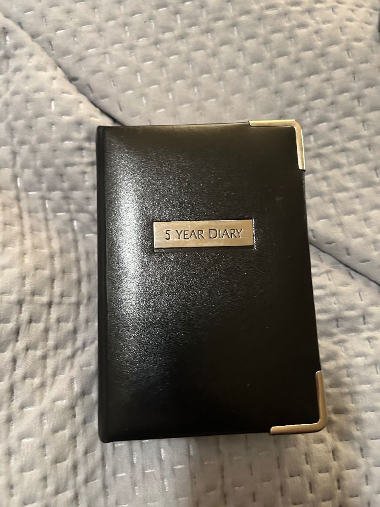 5 year diary new unused black/silver
