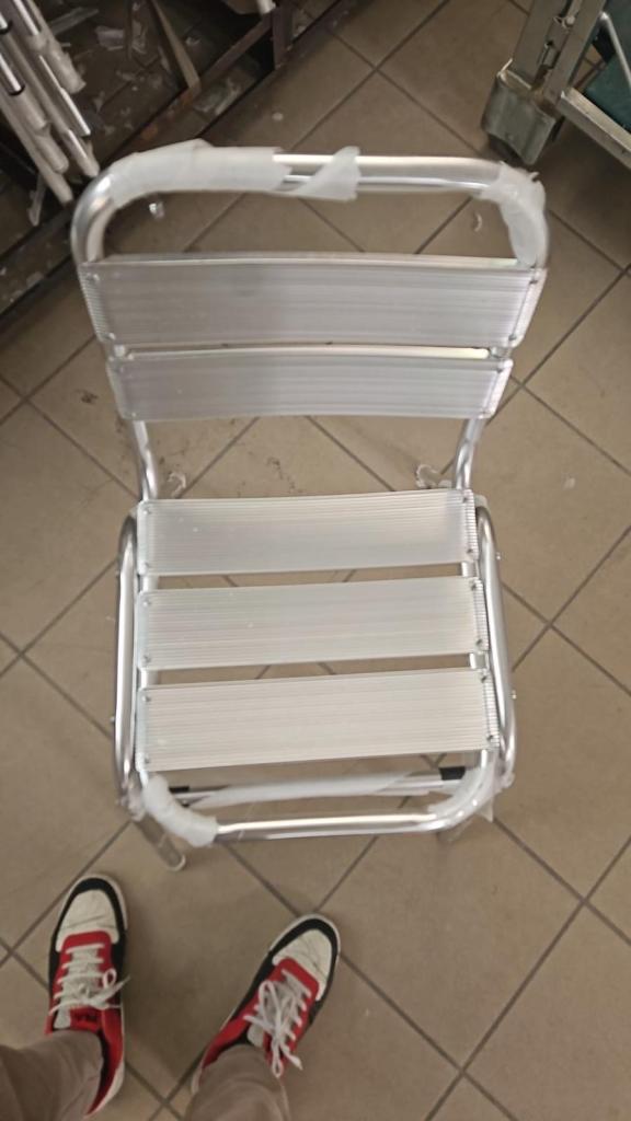 COMMERCIAL GRADE ALUMINIUM STACKING CHAIRS. 