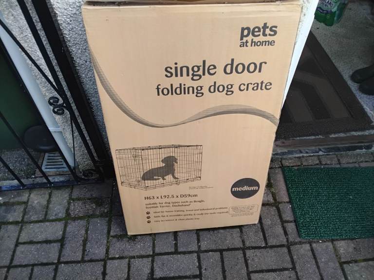 Folding dog crate