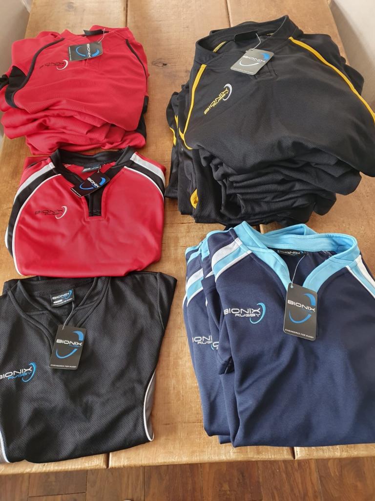 Brand new with tags sports kit 18 x shorts & 37 x tops