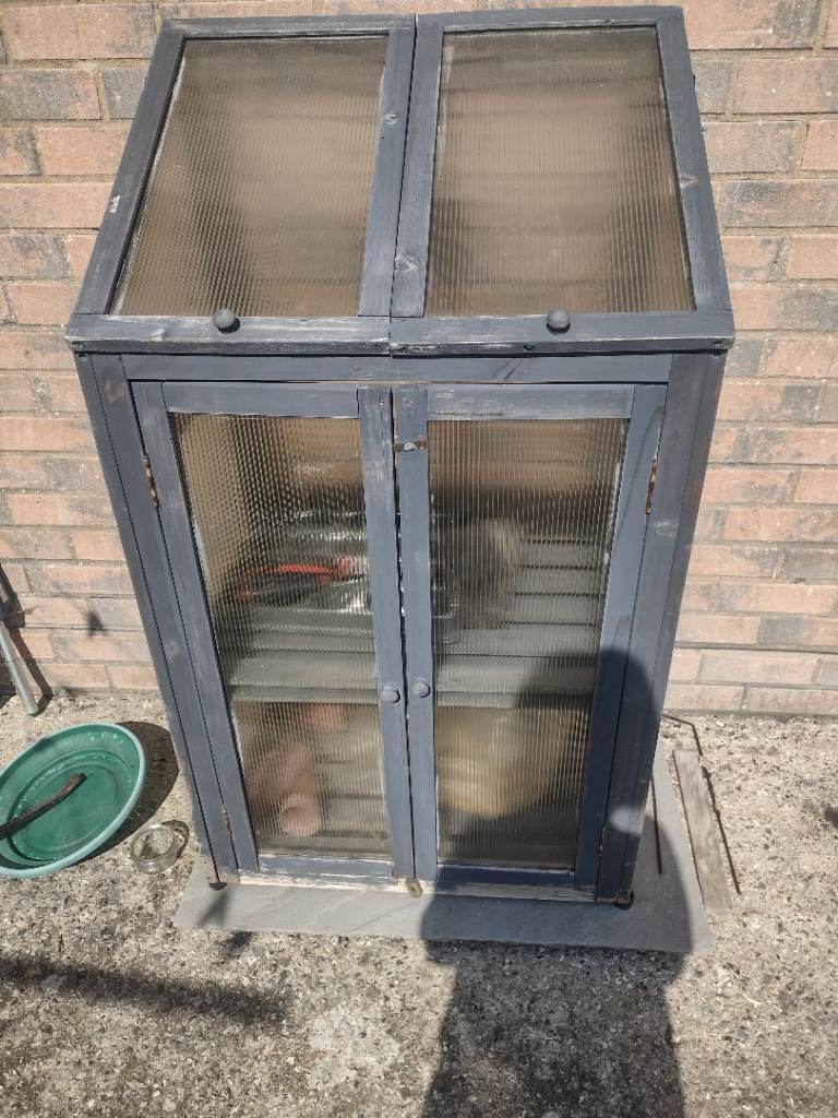 Wooden and perspex greenhouse