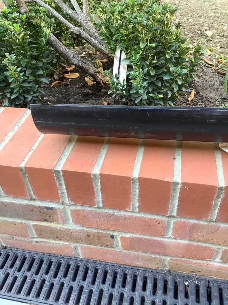 New 5 x 4 metre black guttering 