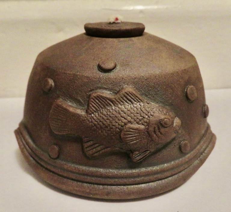 image for Handmade ceramic oil lamp with fun fish design