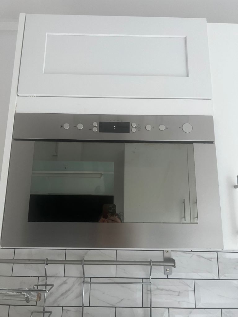 Whirlpool built in combination microwave  model no AMW 498/IX