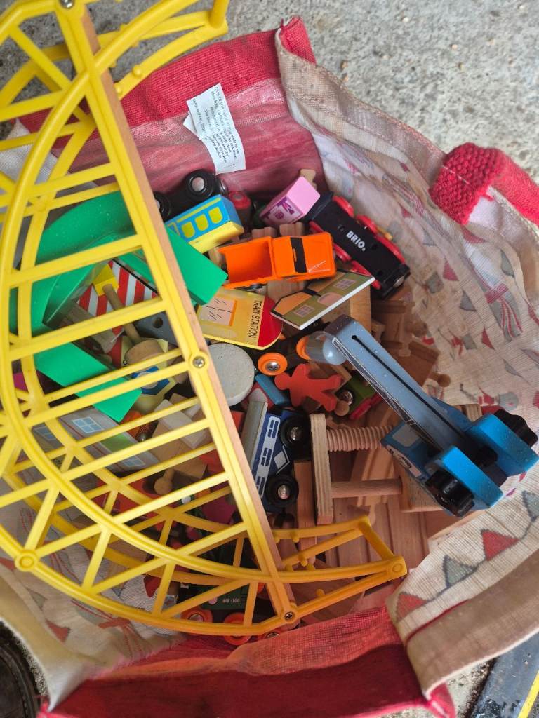 Brio wooden train set who have plenty of trains track Bridge and some figures 