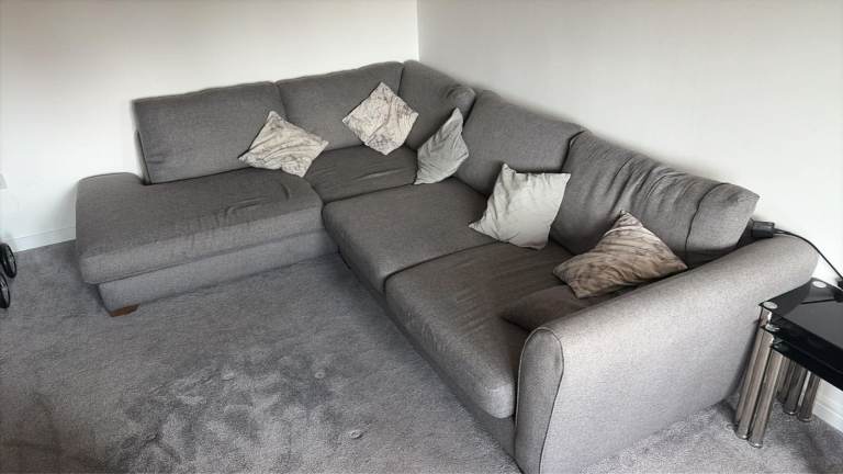 Grey Fabric Corner Sofa and Matching Armchair – Good Condition