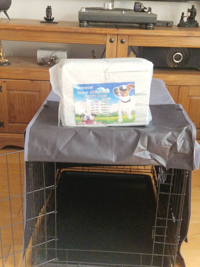 Dog cage with cover and 2 opening front and sideand pack of trainh puppy pads