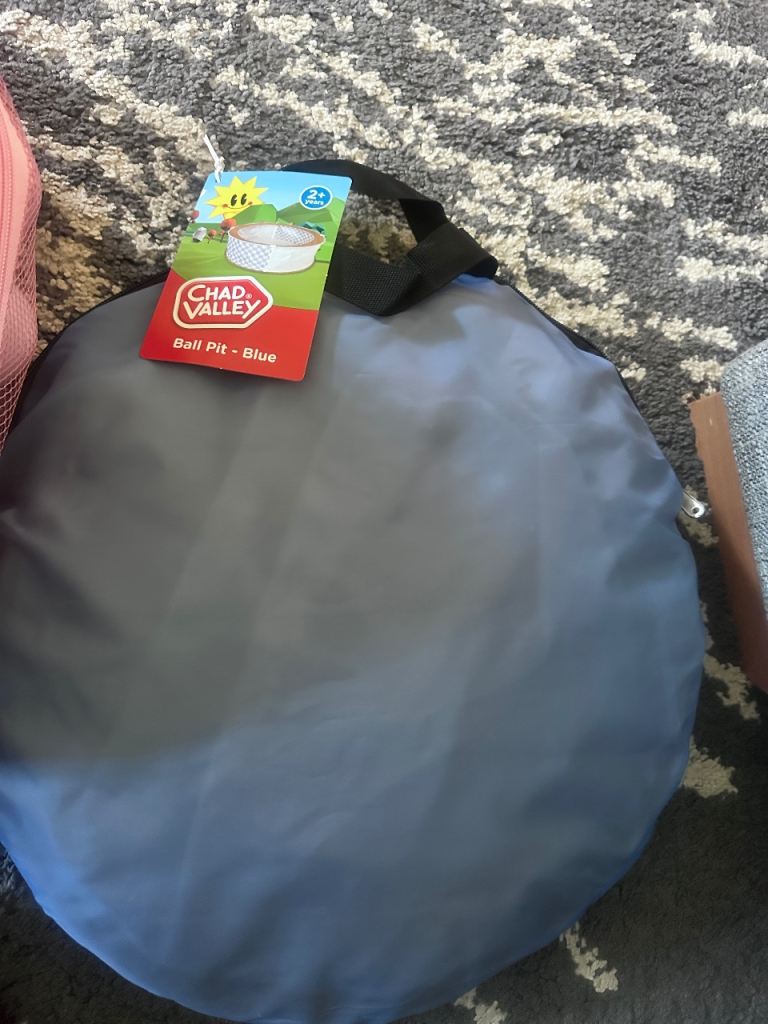 Chad valley ball pit with two bags of balls