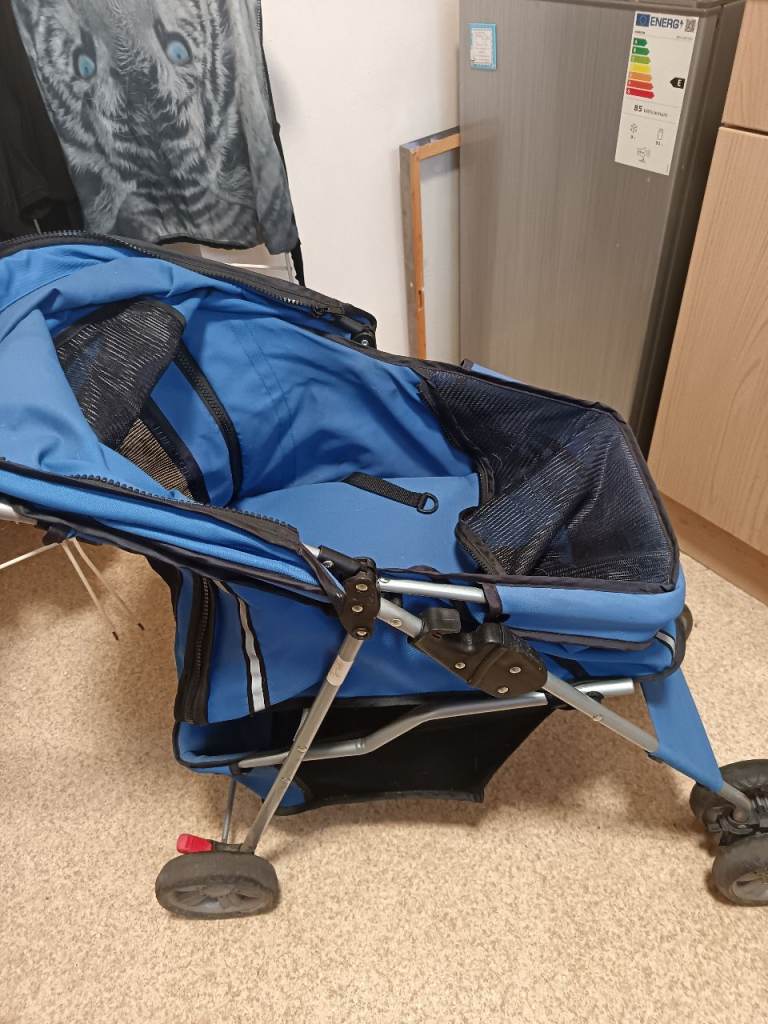Blue doggy pushchair 