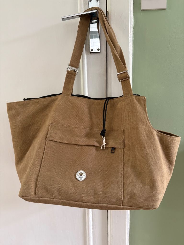 Poms of Soho brown Soho tote bag pet carrier. 