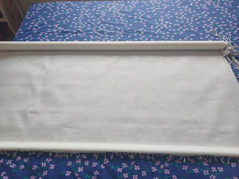 Cream roller blind