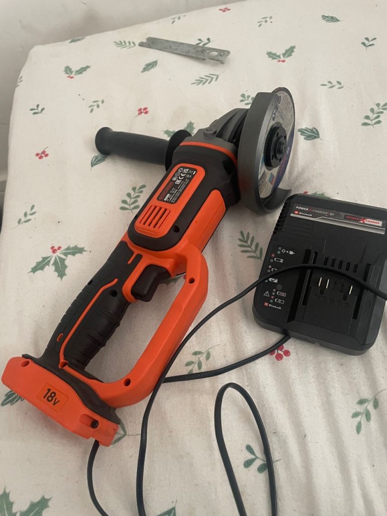 Brand-new Black & Decker 18V Cordless Angle Grinder with Charger – Good Condition
