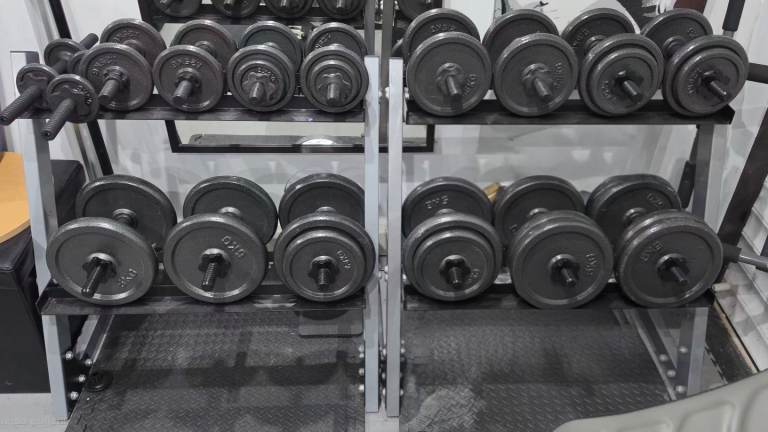 Opti cast iron 8 dumbell weight set (129kg) and 2 stands