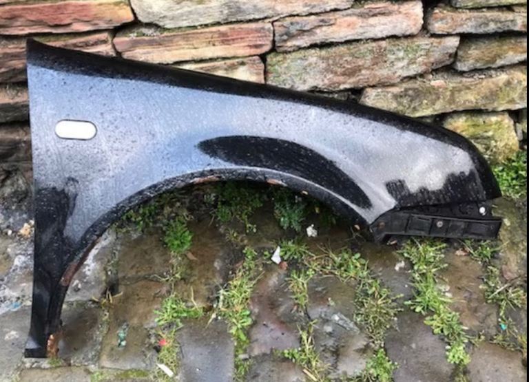 Vw bora front driver side wing in black 