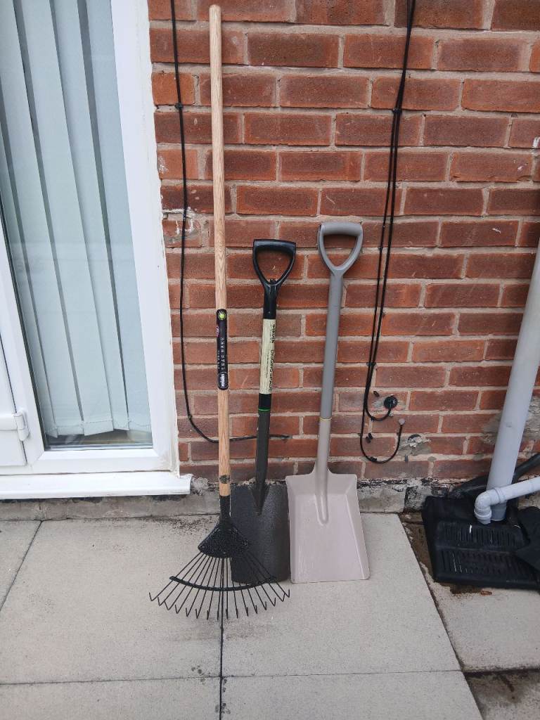 Garden rake shovel and spade 