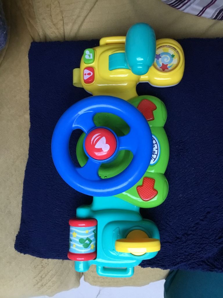 Pre-owned colourful baby toy for car or buggy