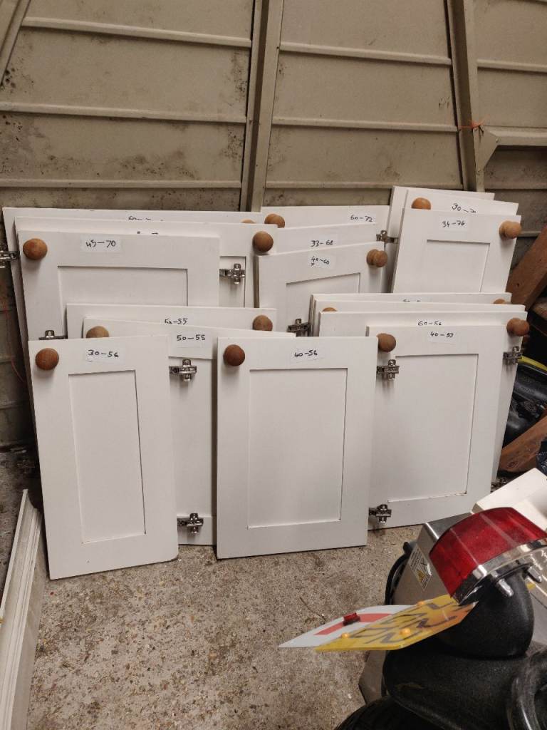 White Kitchen Cabinet Doors with Wooden Knobs – Good Condition