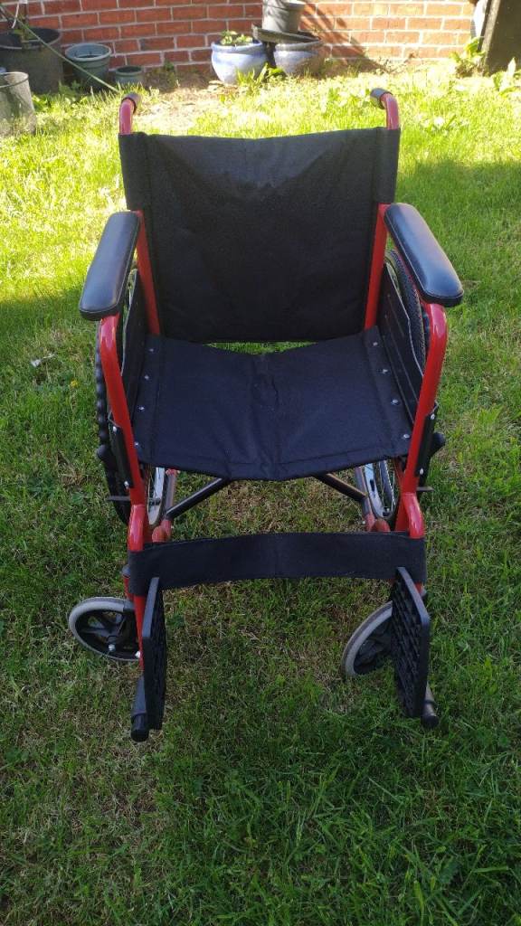 Folding self propelled adult wheelchair with cushions 