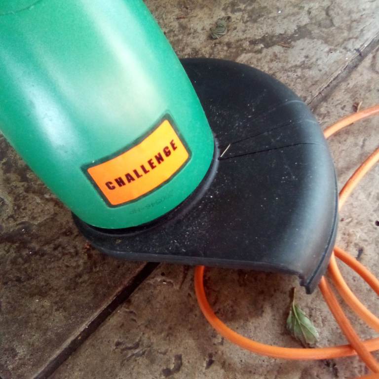 Reduced £12 Challenge grass strimmer, used once, cuts great, comes with instruction booklet